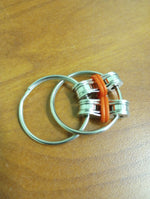 The red Bike Chain Fidget.