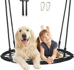 A child and their dog lay across the 40" Tree Swing Set Spider Web Round Swing.