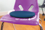The Bouncyband Sit and Twist Active Seat Cushion sits on a purple school chair.