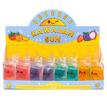 A colorful display of small plastic pouches full of "juice" with a smiley face.