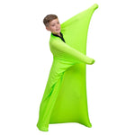 A child stretches out in the green body sock.