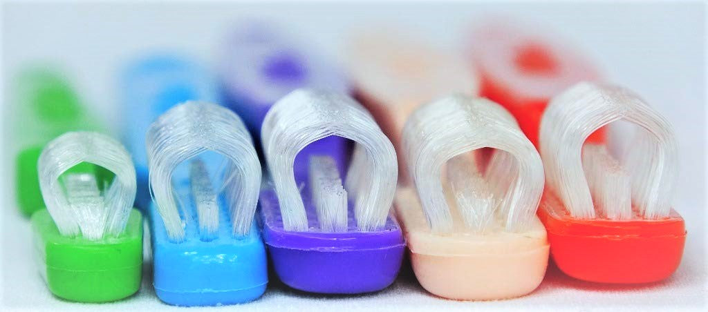 Five toothbrushes with three sides of bristles to support brushing