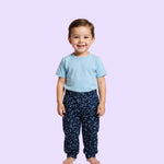 A child wears the constellation Youth Sensory Friendly Fidget Jogger.