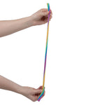 Two hands pull the 13" Rainbow Stretch Noodle.