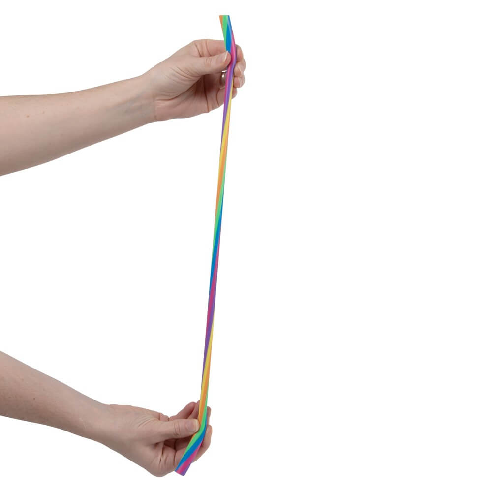 Two hands pull the 13" Rainbow Stretch Noodle.