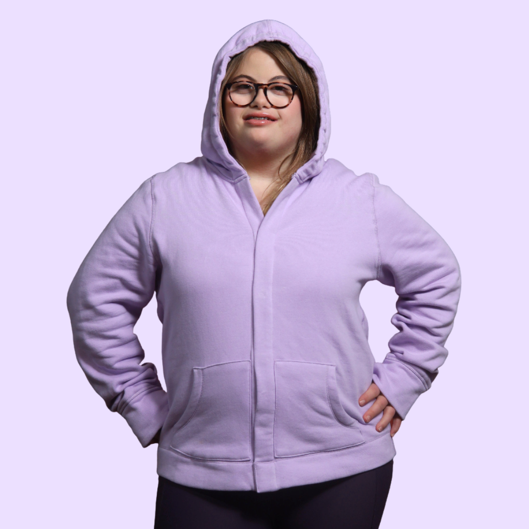 An adult wears the Lilac Sensory Hoodie for Adults.
