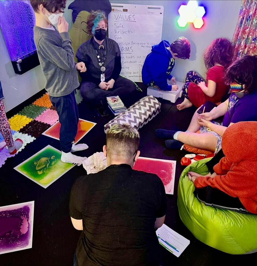 People gathered in a sensory room