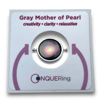 The Mother of Pearl Spinner in its product package.
