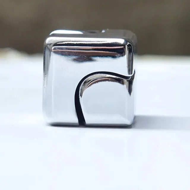 The silver Metal Fidget Cube.