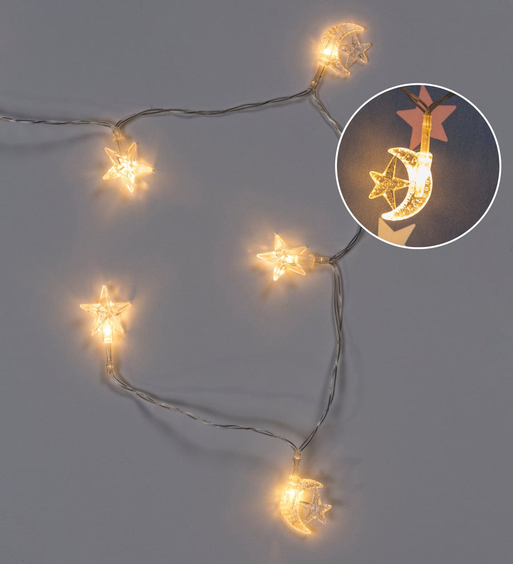 An up-close look at the moon and star lights that come with the Light-Up Celestial Play Tent.