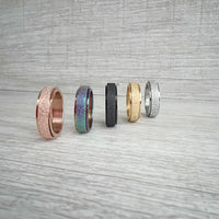 Various colors of the Sweettine Chrome Fidget Rings.