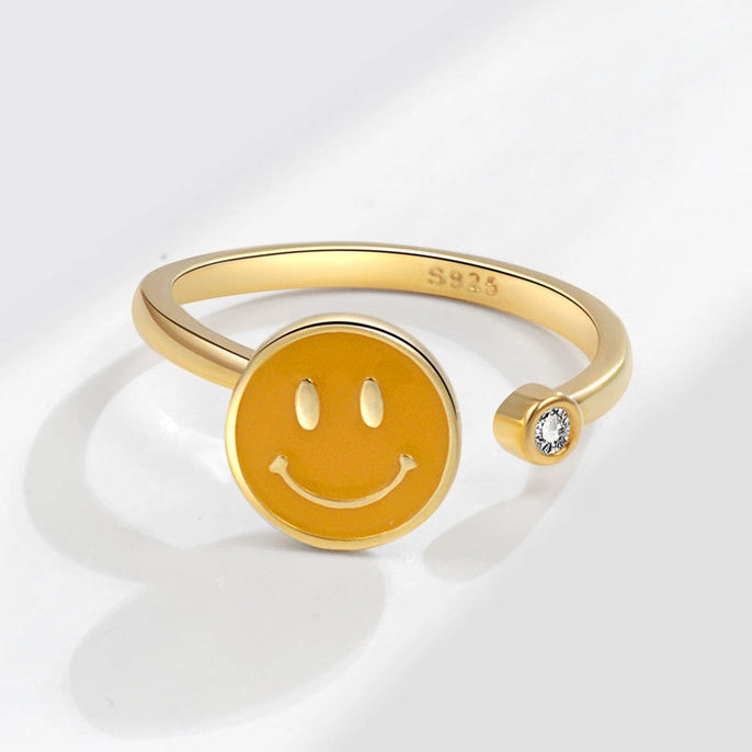 The Smiley Face Fidget Ring in 925 Sterling Silver with Cubic Zirconia.