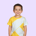 A child smiles and wears the Yellow and Mint Easy to See Sensory T-Shirt for Kids.