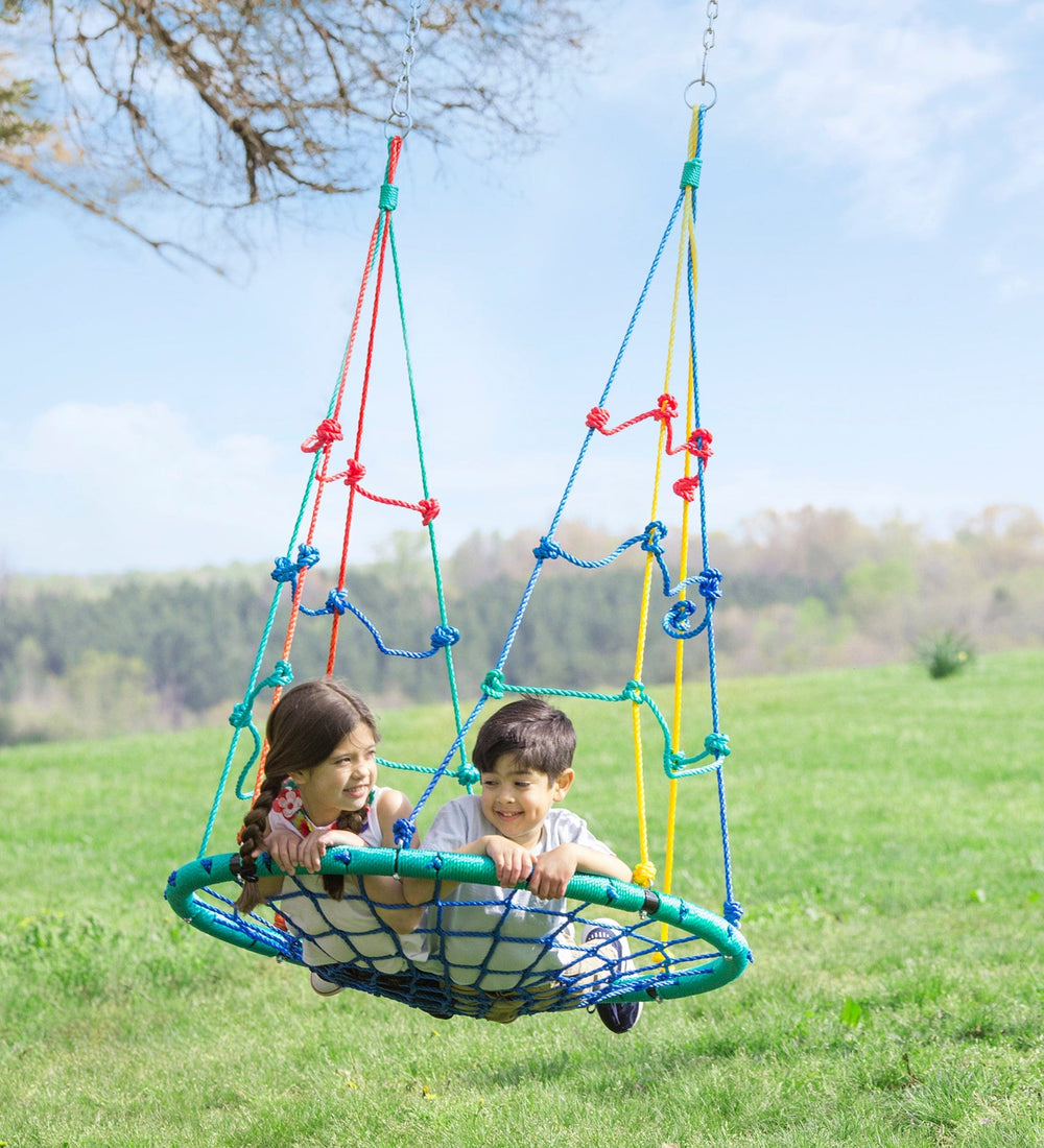 Two children lay belly down on the 2-in-1 Climbing Rope Swing.
