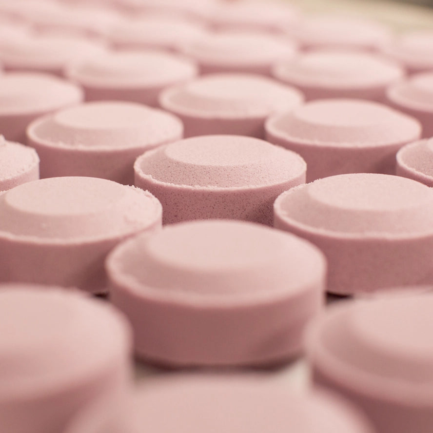 A spread of purple Lavendar Mad Sass Soap Co Shower Steamers.