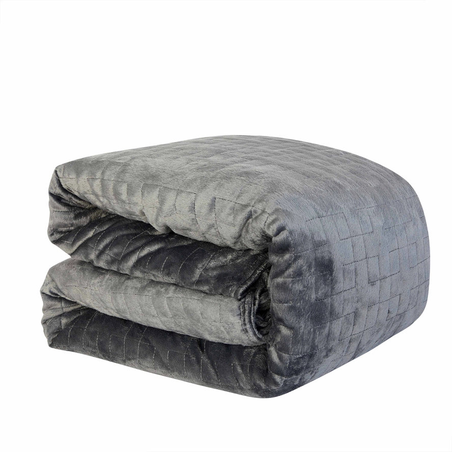 The Sutton Home Removable Washable Duvet Weighted Blanket 20 lb folded neatly.