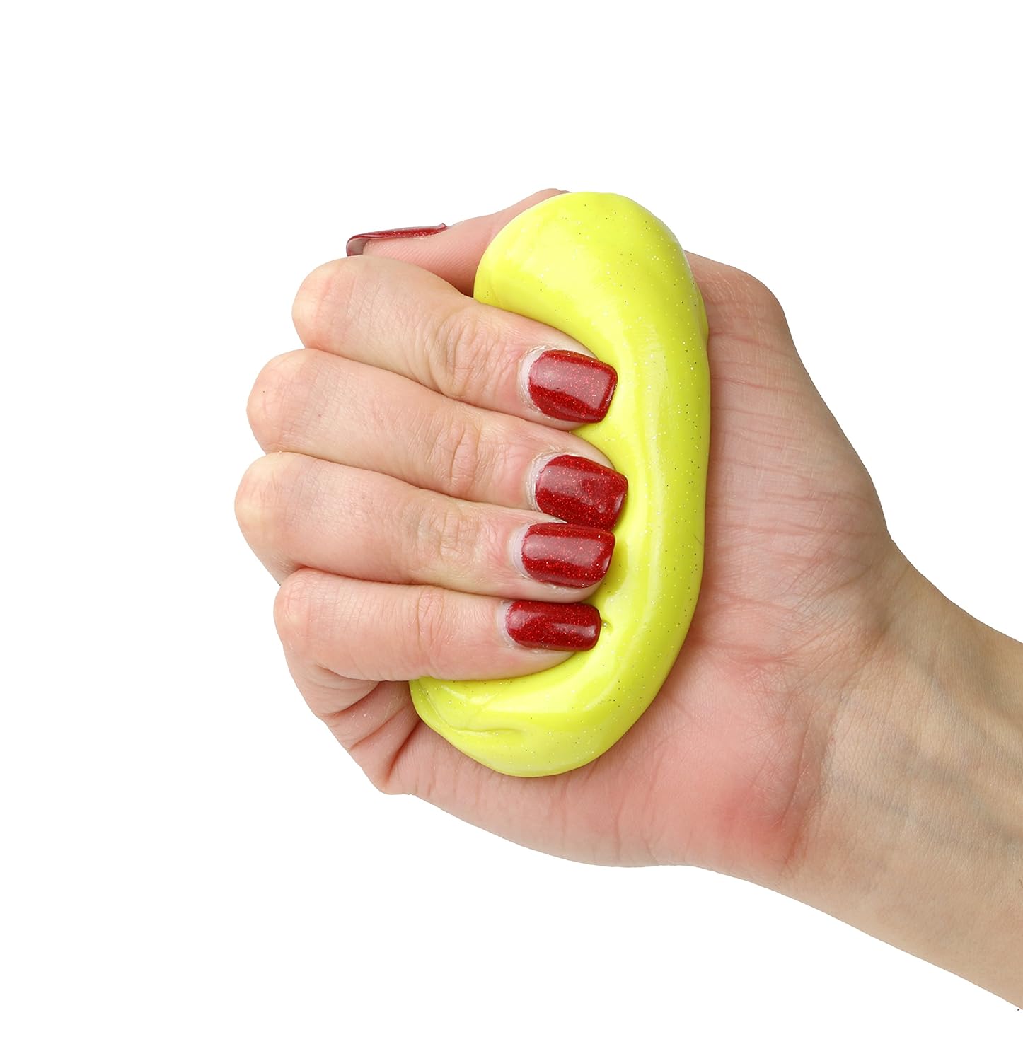 A hand with light skin tone and red sparkly nail polish squeezes the yellow Sparkle TheraPutty.