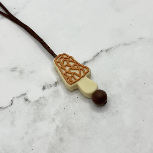 The Morel Mushroom Fidget Necklace.