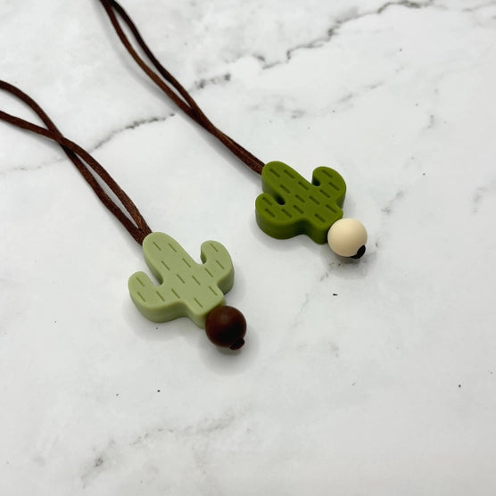 The two Cactus Fidget Necklaces.