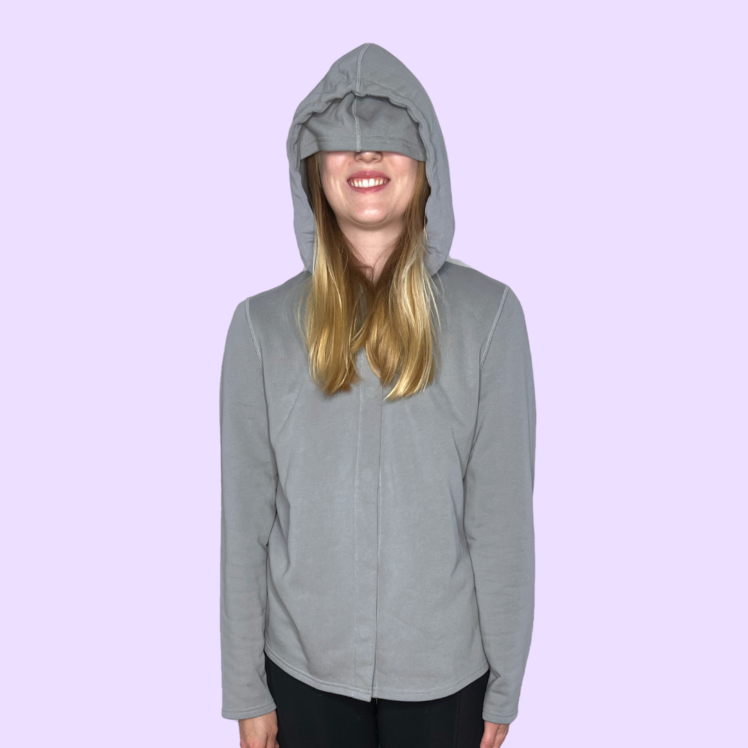 The Gray French Terry Sensory Hoodie for Adults worn with the eye mask pulled down.