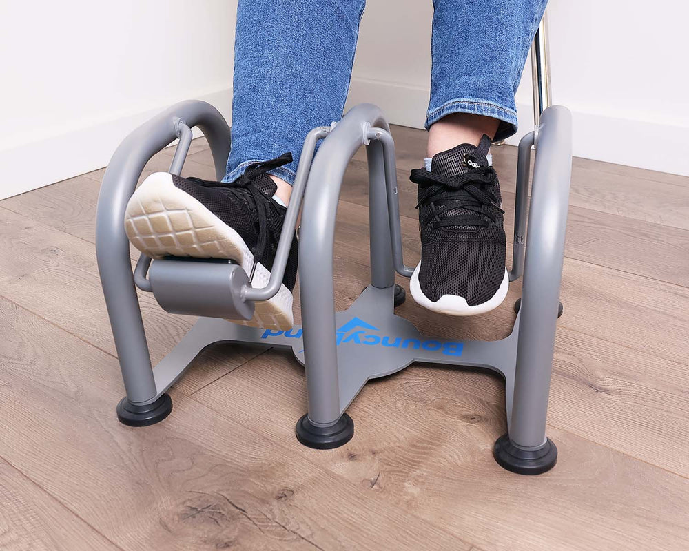 Two feet sit on the Dual Pedal Portable Foot Swing.