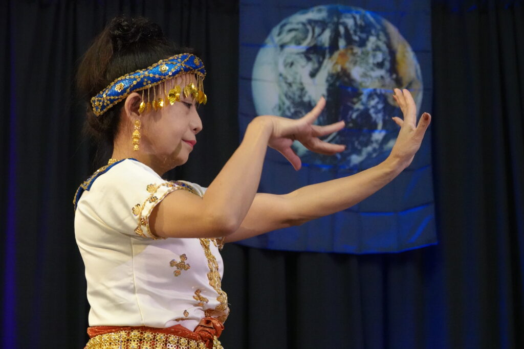 Filipino woman performing on stage