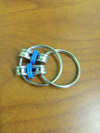 The royal blue Bike Chain Fidget.