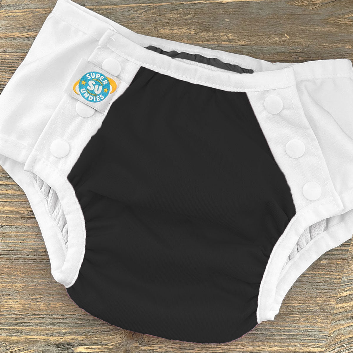 The Front Snapping Tux 3-in-1 Diapers for Big Kids.