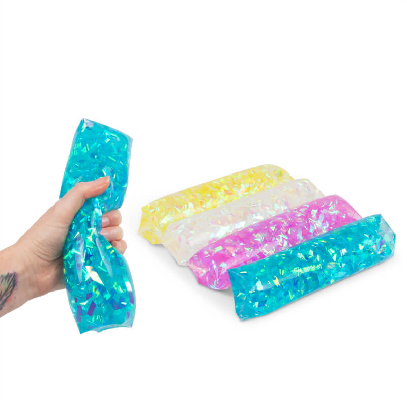 A hand squeezes the blue Shake & Shimmer Water Wriggler.