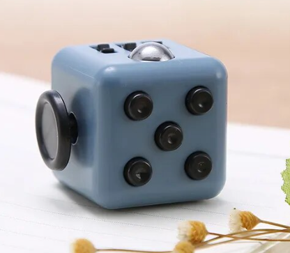 The gray Fidget Cube.