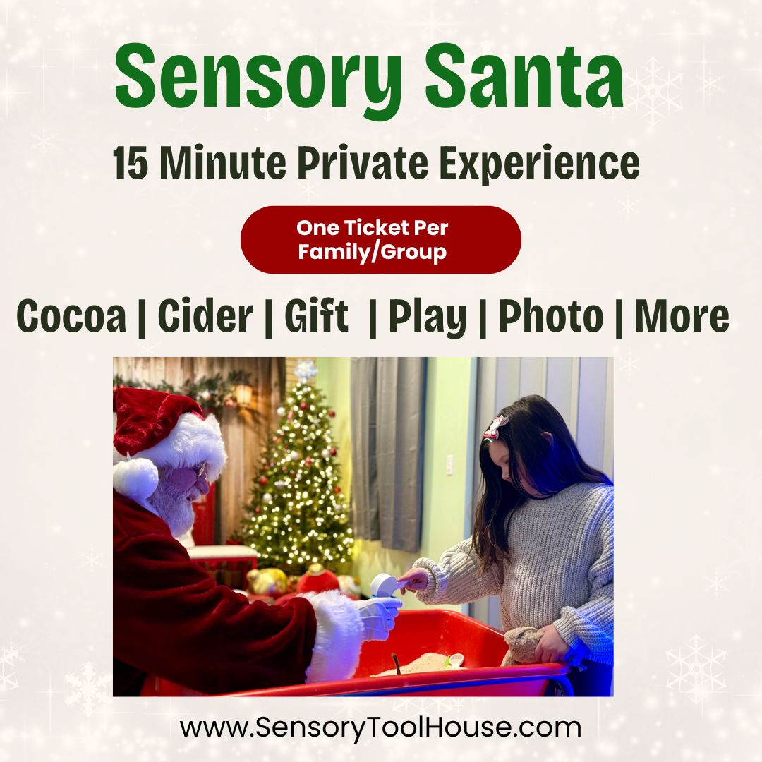 Santa Clause Playing in sensory rice bin with young girl with long black hair and a grey sweater on. Christmas tree in background