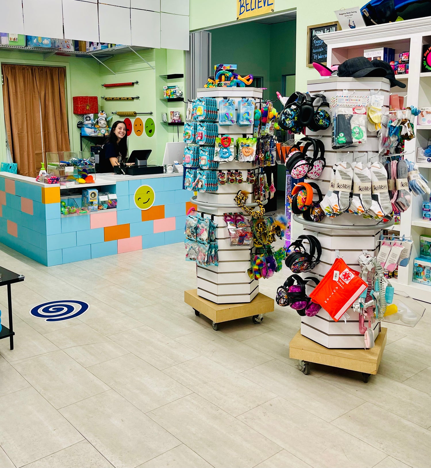 Woman at checkout counter in store