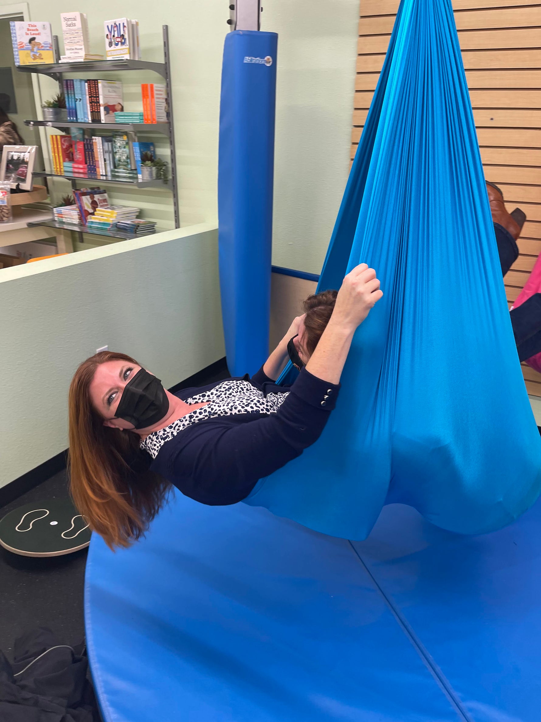 Woman in a sensory swing