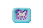 The hidden side of the Mega Unicorn Surprise Bath Bomb with one of the versions of the toy unicorn.