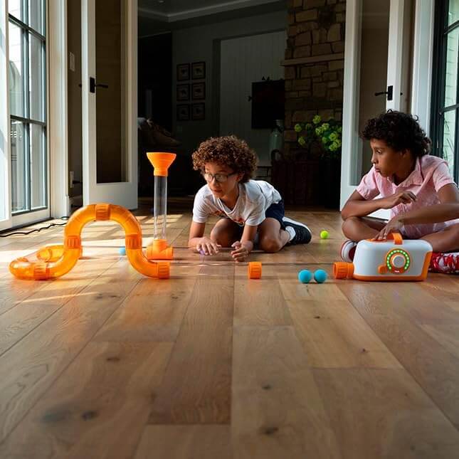 Two children play with Air Toobz.