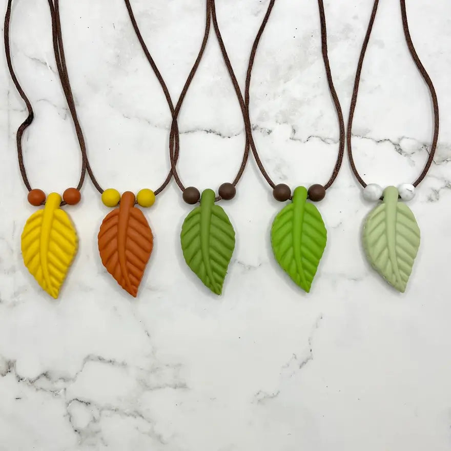 The many different colors of Large Leaf Chewy Fidget Necklace.