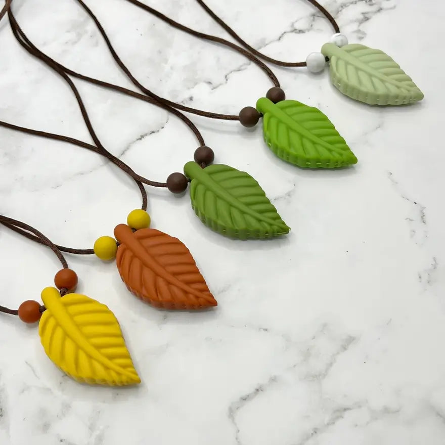 The many different colors of Large Leaf Chewy Fidget Necklace.