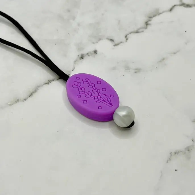 The Lavender Chewy Fidget Necklace.