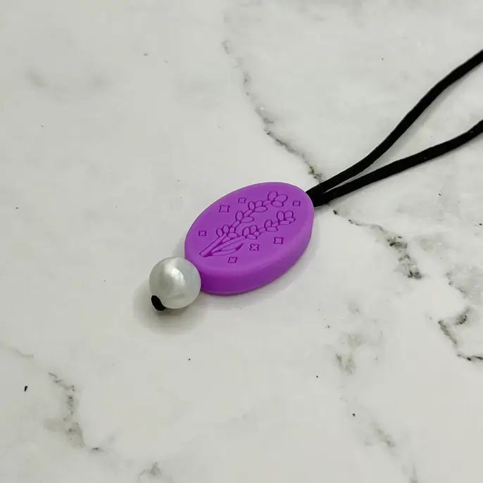 The Lavender Chewy Fidget Necklace.