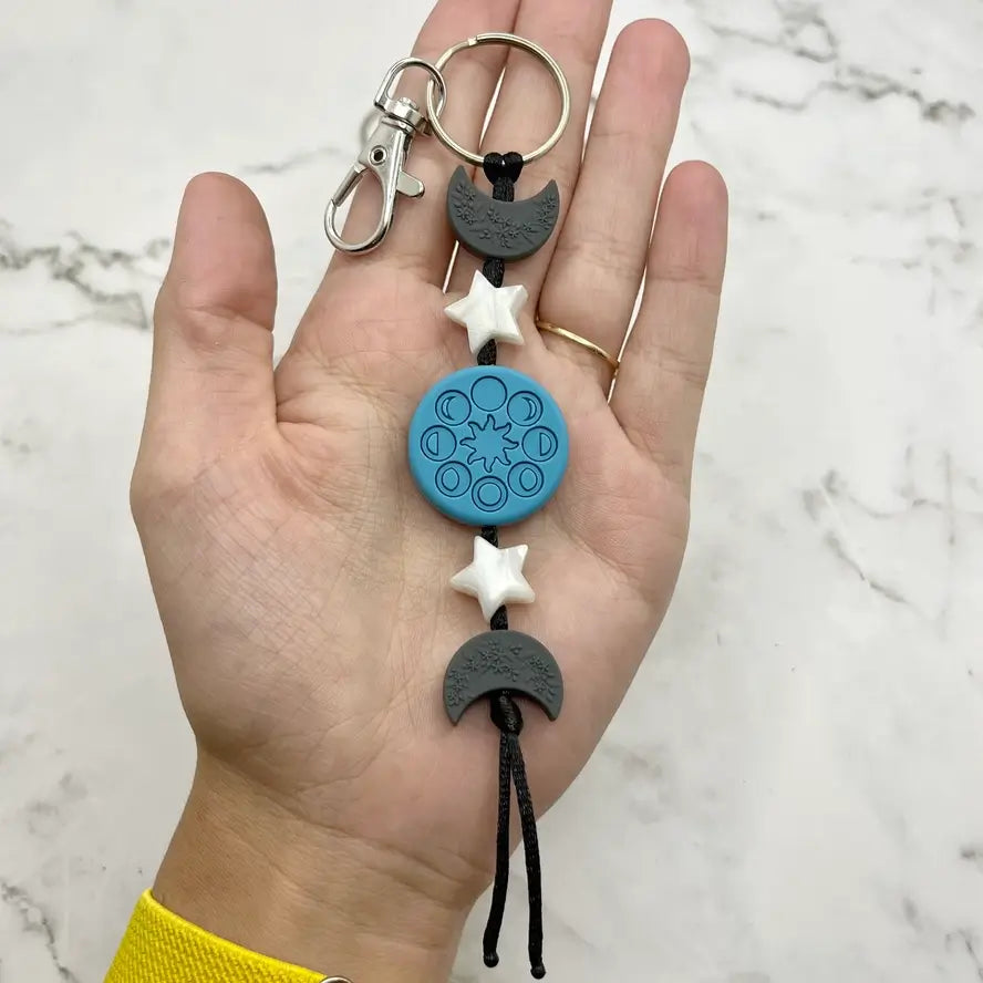 The blue Moon Phases Chewy Fidget Keychain.