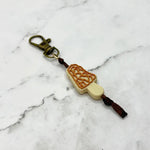 The Morel Chewy Fidget Zipper Pull/Keychain.