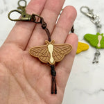 The brown Moth Chewy Fidget Zipper Pull/Keychain.