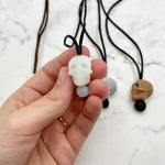 The opaque Skull Fidget Chewable Jewelry  Necklace.