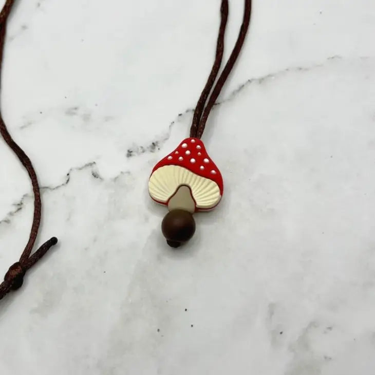 The red Spotted Mushroom Fidget Chewable Jewelry Necklace.