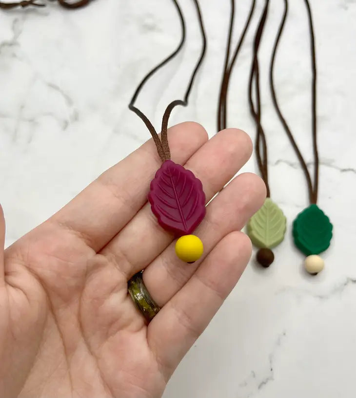 The Beet Red Textured Leaf Fidget Chewable Jewelry Necklace.