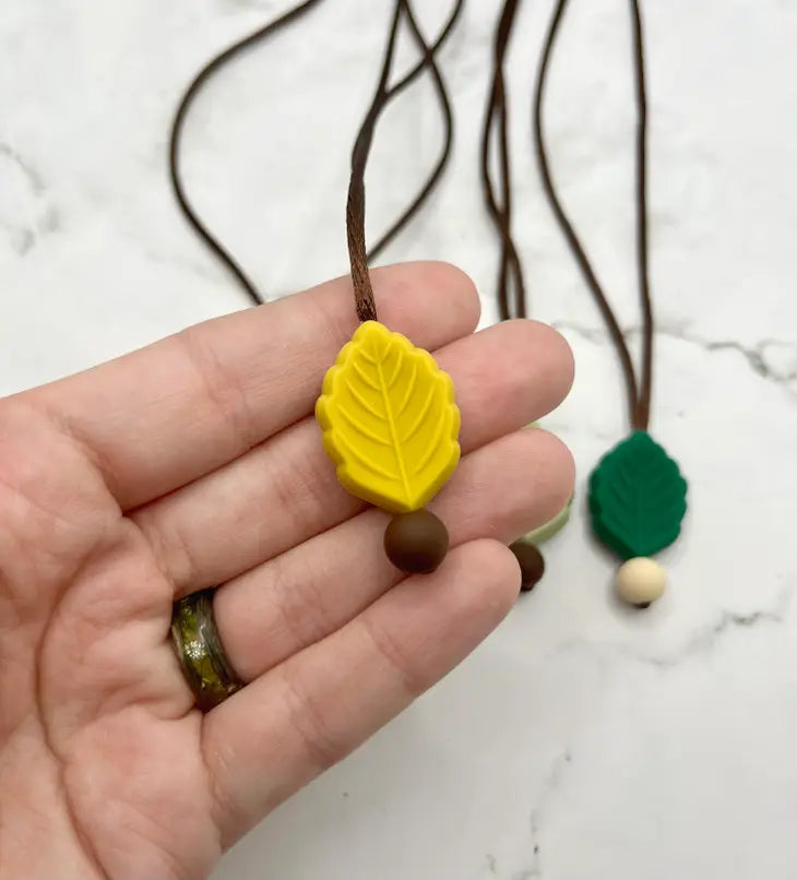 The yellow Textured Leaf Fidget Chewable Jewelry Necklace.