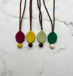 The four colors of Textured Leaf Fidget Chewable Jewelry Necklace.