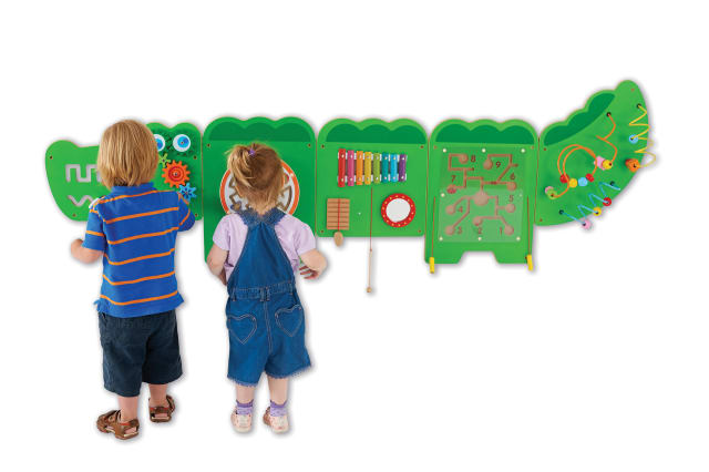 Two children play at the head of the Crocodile Activity Wall Panels.