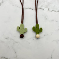 The two Cactus Fidget Necklace.