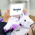The Weighted Washable Lap Pad Unicorn providing calm on a child's chest.